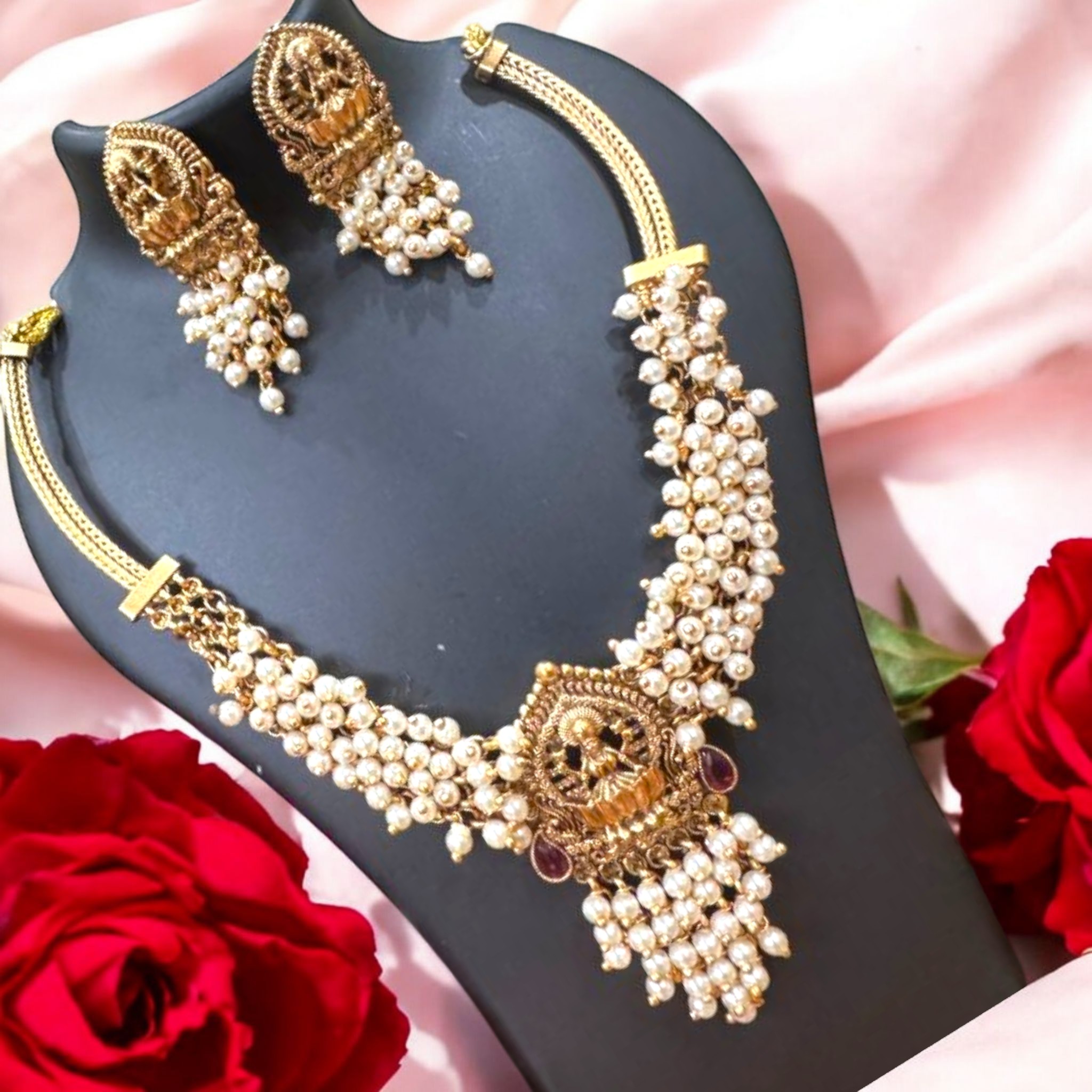 Gold toned Pearl Cluster Lakshmi Statement Necklace